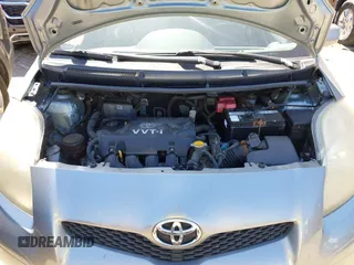 2009 Toyota Yaris with VIN JTDJT903495263456, listed as a IAAI auction lot 42135019 with 219,704 mi miles. Bid and sale history available at carsss.com. Image 10.