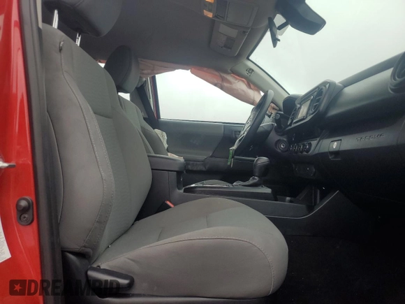 2018 Toyota Tacoma SR z VIN 5TFCZ5AN8JX143944, wystawiony jako Copart lot #57092795 z przebiegiem 67 094 mil mil oraz Szkoda całkowita • Salvage title. Historia ofert i sprzedaży dostępna na DreamBid. Obrazek 7.
