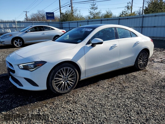 2021 Mercedes-Benz CLA with VIN W1K5J4HBXMN199220, listed as a Copart auction lot 86673214 with 29,801 mi miles and Salvage Title. Bid and sale history available at carsss.com. Image 1.