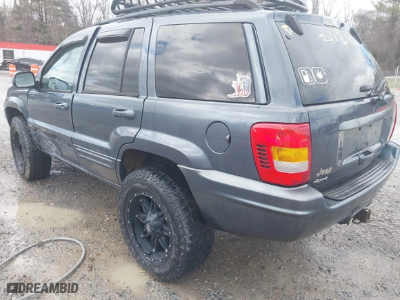 2003 Jeep Grand Cherokee Limited with VIN 1J4GW58N43C521617, listed as a IAAI auction lot 41781064 with 228,086 mi miles. Bid and sale history available at carsss.com. Image 3.