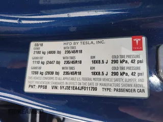 2018 Tesla Model 3 Long Range Battery with VIN 5YJ3E1EA4JF011799, listed as a IAAI auction lot 41765860 with 133,098 mi miles. Bid and sale history available at carsss.com. Image 9.