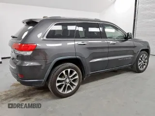 2018 Jeep Grand Cherokee Limited z VIN 1C4RJEBG3JC340061, wystawiony jako Copart lot #56654975 z przebiegiem 151 443 mil mil oraz Czysty tytuł • Clean title. Historia ofert i sprzedaży dostępna na DreamBid. Obrazek 3.