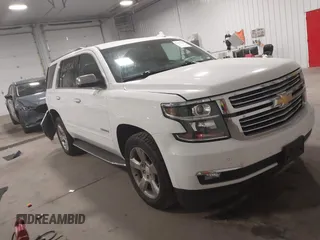 2018 Chevrolet Tahoe Premier with VIN 1GNSKCKC1JR249293, listed as a IAAI auction lot 42237526 with 126,302 mi miles and . Bid and sale history available at DreamBid. Image 1.