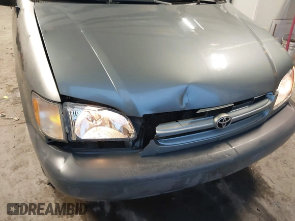 1999 Toyota Sienna CE with VIN 4T3GF19C5XU139787, listed as a IAAI auction lot 41167781 with 217,715 mi miles. Bid and sale history available at carsss.com. Image 6.