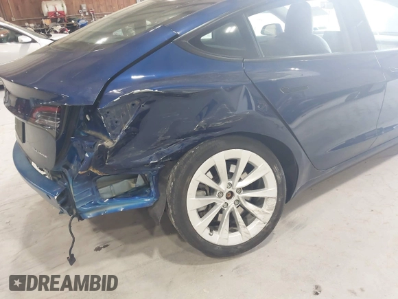 2022 Tesla Model 3 Long Range with VIN 5YJ3E1EB8NF255163, listed as a IAAI auction lot 42105451 with 40,166 mi miles and . Bid and sale history available at DreamBid. Image 6.