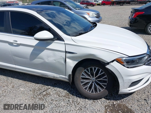 2019 Volkswagen Jetta SEL z VIN 3VWE57BU1KM111170, wystawiony jako IAAI lot #42179819 z przebiegiem 92 300 mil mil oraz . Historia ofert i sprzedaży dostępna na DreamBid. Obrazek 6.