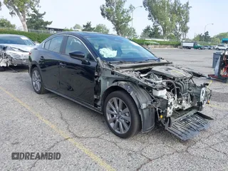 2024 Mazda 3 S Preferred with VIN 3MZBPACM0RM417120, listed as a IAAI auction lot 42338371 with Not provided miles and . Bid and sale history available at DreamBid. Image 1.