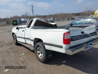 1997 Toyota T100 DX with VIN JT4UN22D9V0047212, listed as a IAAI auction lot 41801996 with 77,524 mi miles. Bid and sale history available at carsss.com. Image 3.