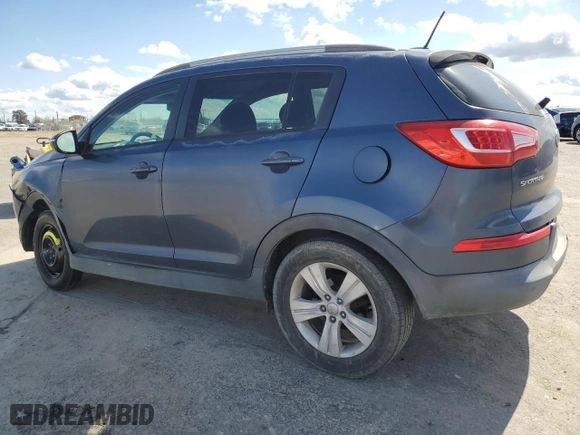 2012 Kia Sportage LX with VIN KNDPB3A25C7228825, listed as a Copart auction lot 51379475 with 184,372 mi miles and Salvage Title. Bid and sale history available at carsss.com. Image 2.