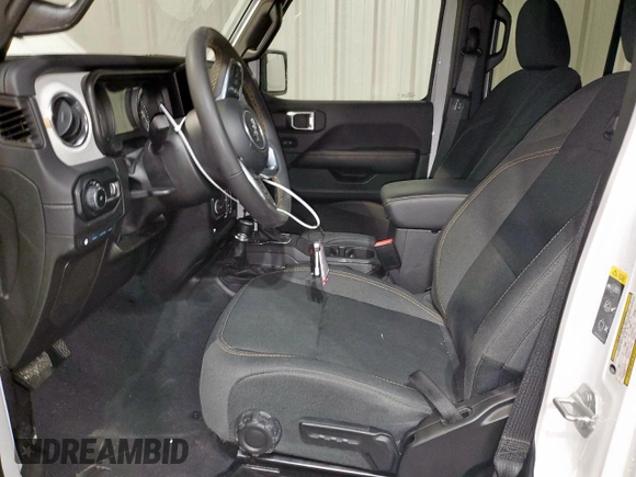 2024 Jeep Wrangler Sahara with VIN 1C4RJXP65RW331514, listed as a Copart auction lot 56888935 with 18,507 mi miles and Clean Title. Bid and sale history available at DreamBid. Image 7.