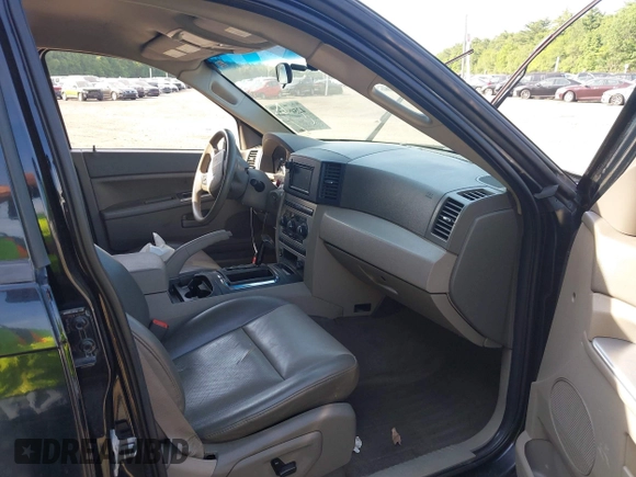 2005 Jeep Grand Cherokee Laredo z VIN 1J4GR48K65C725099, wystawiony jako IAAI lot #42509223 z przebiegiem 249 216 mil mil oraz . Historia ofert i sprzedaży dostępna na DreamBid. Obrazek 5.