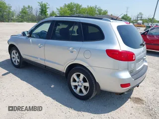 2009 Hyundai Santa Fe SE with VIN 5NMSH73E69H233055, listed as a IAAI auction lot 42454100 with 209,036 mi miles and . Bid and sale history available at DreamBid. Image 3.