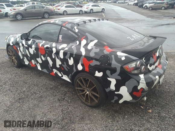 2008 Hyundai Tiburon GT z VIN KMHHN66F58U262230, wystawiony jako IAAI lot #33619963 z przebiegiem 150 708 mil mil oraz . Historia ofert i sprzedaży dostępna na DreamBid. Obrazek 3.