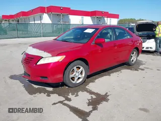 2007 Toyota Camry CE with VIN JTNBE46K073031988, listed as a IAAI auction lot 42062321 with 238,925 mi miles. Bid and sale history available at carsss.com. Image 21.