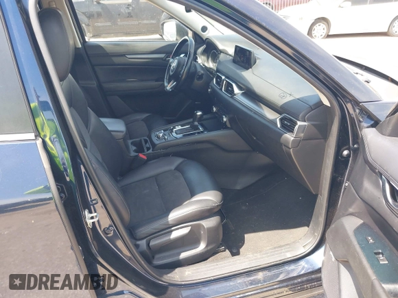 2018 Mazda CX-5 Touring z VIN JM3KFACM7J1410275, wystawiony jako IAAI lot #42248830 z przebiegiem 101 125 mil mil oraz . Historia ofert i sprzedaży dostępna na DreamBid. Obrazek 5.