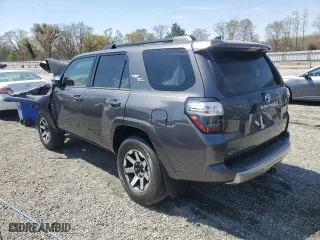 2021 Toyota 4Runner TRD Off Road with VIN JTEPU5JR0M5877962, listed as a Copart auction lot 50973355 with 61,539 mi miles and Salvage Title. Bid and sale history available at carsss.com. Image 2.