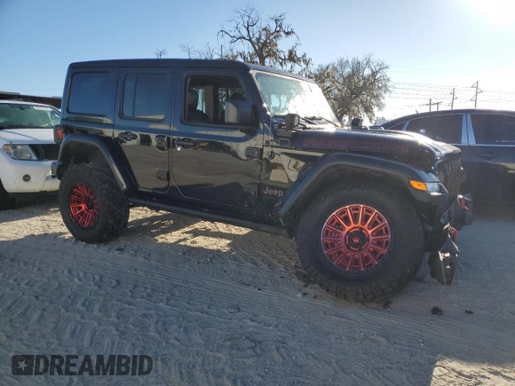 2023 Jeep Wrangler Rubicon z VIN 1C4HJXFN3PW618061, wystawiony jako Copart lot #81957524 z przebiegiem 25 880 mil mil oraz Szkoda całkowita • Salvage title. Historia ofert i sprzedaży dostępna na DreamBid. Obrazek 4.