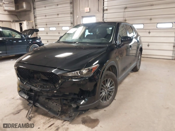 2019 Mazda CX-5 Touring with VIN JM3KFACM7K1568732, listed as a IAAI auction lot 41866736 with 50,753 mi miles. Bid and sale history available at carsss.com. Image 17.