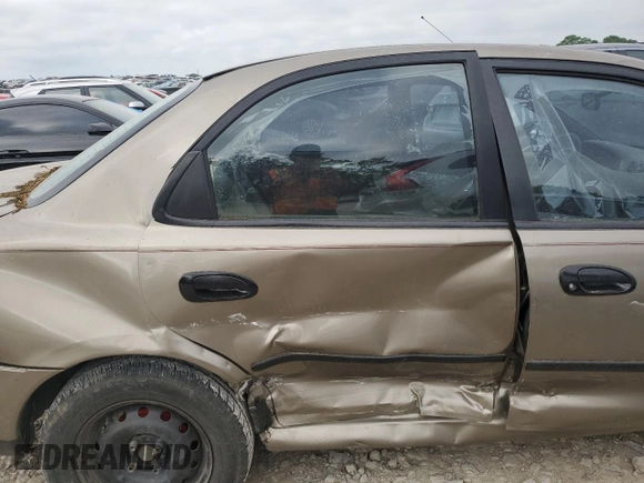 1997 Mazda Protege DX z VIN JM1BC1414V0103244, wystawiony jako Copart lot #56219745 z przebiegiem Nie podano mil oraz Szkoda całkowita • Salvage title. Historia ofert i sprzedaży dostępna na DreamBid. Obrazek 10.