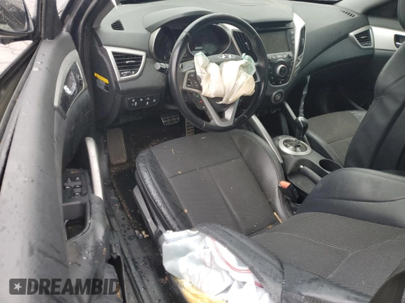 2015 Hyundai Veloster z VIN KMHTC6AD4FU241307, wystawiony jako Copart lot #53704525 z przebiegiem Nie podano mil oraz Szkoda całkowita • Salvage title. Historia ofert i sprzedaży dostępna na DreamBid. Obrazek 8.