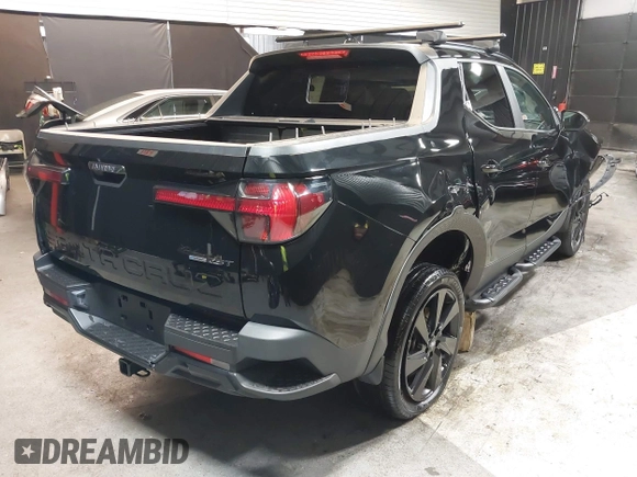 2023 Hyundai Santa Cruz Night Edition z VIN 5NTJCDAF0PH059683, wystawiony jako IAAI lot #42075765 z przebiegiem 25 077 mil mil oraz . Historia ofert i sprzedaży dostępna na DreamBid. Obrazek 4.
