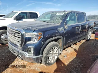 2021 GMC Sierra 1500 SLT z VIN 3GTU9DET0MG369332, wystawiony jako Copart lot #46650135 z przebiegiem 148 095 mil mil oraz Szkody całkowita. Historia ofert i sprzedaży dostępna na DreamBid. Obrazek 1.