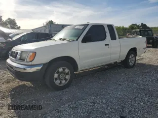 1999 Nissan Frontier XE with VIN 1N6DD26S4XC319806, listed as a Copart auction lot 54233635 with 311,759 mi miles and Clean title. Bid and sale history available at DreamBid. Image 1.