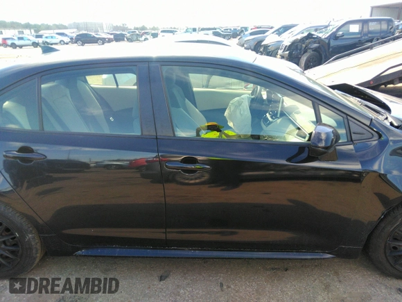 2021 Toyota Corolla LE with VIN JTDEPMAE5MJ126390, listed as a IAAI auction lot 41669331 with 77,398 mi miles. Bid and sale history available at carsss.com. Image 13.