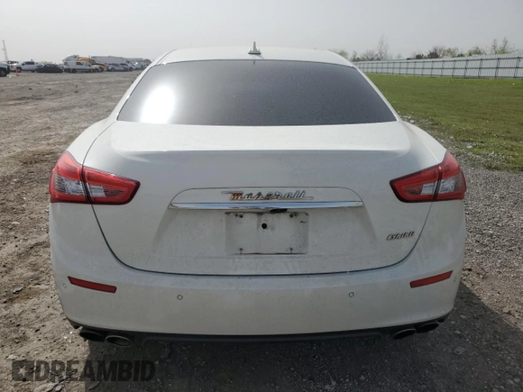 2017 Maserati Ghibli with VIN ZAM57XSA6H1233933, listed as a Copart auction lot 49089525 with 76,965 mi miles and Salvage Title. Bid and sale history available at carsss.com. Image 6.