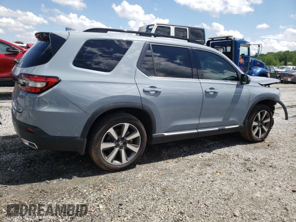 2023 Honda Pilot Touring with VIN 5FNYG2H78PB006054, listed as a Copart auction lot 56039785 with 35,831 mi miles and Salvage title. Bid and sale history available at DreamBid. Image 3.