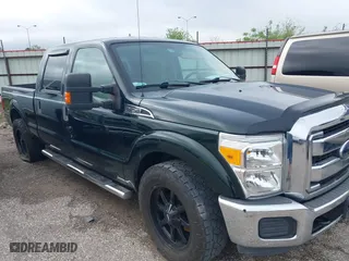 2014 Ford Super Duty F-250 SRW XL with VIN 1FT7W2A60EEB12223, listed as a IAAI auction lot 41809927 with 99,534 mi miles. Bid and sale history available at carsss.com. Image 1.
