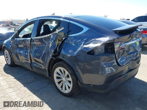 2018 Tesla Model X 75D with VIN 5YJXCBE26JF121937, listed as a IAAI auction lot 41652666 with 93,478 mi miles and . Bid and sale history available at carsss.com. Image 3.