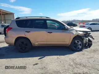 2009 Toyota RAV4 with VIN JTMZF33V995000660, listed as a IAAI auction lot 41633209 with 106,959 mi miles. Bid and sale history available at carsss.com. Image 13.