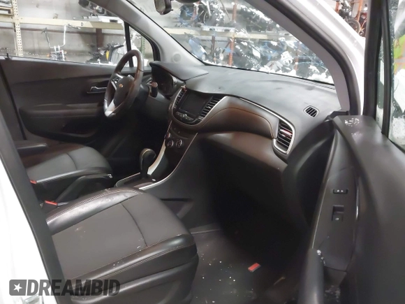 2020 Chevrolet Trax LT with VIN KL7CJLSB3LB072231, listed as a IAAI auction lot 41293558 with 58,297 mi miles and . Bid and sale history available at DreamBid. Image 5.