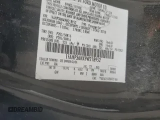 2009 Ford Focus SES with VIN 1FAHP36NX9W218952, listed as a Copart auction lot 51056805 with 194,270 mi miles and Salvage Title. Bid and sale history available at carsss.com. Image 12.