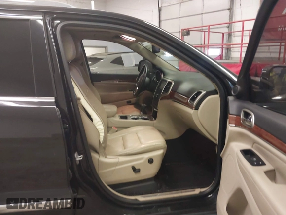 2012 Jeep Grand Cherokee Limited with VIN 1C4RJEBG4CC129194, listed as a IAAI auction lot 41168750 with 184,077 mi miles. Bid and sale history available at carsss.com. Image 5.