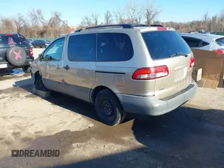 2003 Toyota Sienna LE with VIN 4T3ZF13C03U524122, listed as a IAAI auction lot 41655361 with 216,256 mi miles. Bid and sale history available at carsss.com. Image 3.