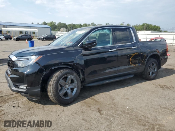 2022 Honda Ridgeline RTL-E with VIN 5FPYK3F7XNB023787, listed as a Copart auction lot 66883515 with 49,786 mi miles and Salvage title. Bid and sale history available at DreamBid. Image 1.