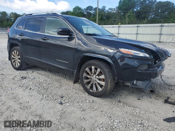 2016 Jeep Cherokee Overland with VIN 1C4PJLJB2GW302605, listed as a Copart auction lot 55143364 with 124,559 mi miles and Salvage title. Bid and sale history available at DreamBid. Image 4.