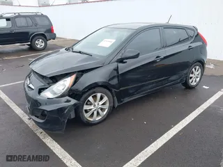 2012 Hyundai Accent SE with VIN KMHCU5AE1CU035390, listed as a IAAI auction lot 41765900 with 127,685 mi miles. Bid and sale history available at carsss.com. Image 2.