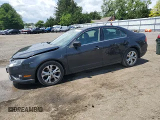 2012 Ford Fusion SE z VIN 3FAHP0HA7CR306411, wystawiony jako Copart lot #60476635 z przebiegiem 173 779 mil mil oraz Szkoda całkowita • Salvage title. Historia ofert i sprzedaży dostępna na DreamBid. Obrazek 1.