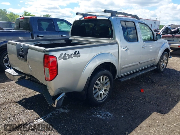 2011 Nissan Frontier Pro-4X with VIN 1N6AD0EV0BC408218, listed as a IAAI auction lot 42187823 with 165,995 mi miles and . Bid and sale history available at DreamBid. Image 4.