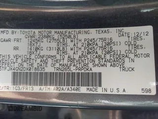 2013 Toyota Tacoma PreRunner with VIN 5TFJX4GN2DX018635, listed as a IAAI auction lot 41223225 with 275,094 mi miles and . Bid and sale history available at DreamBid. Image 9.