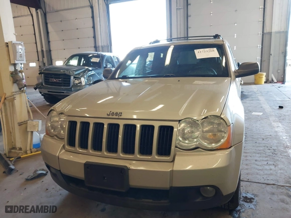 2010 Jeep Grand Cherokee Laredo with VIN 1J4RR4GT9AC106381, listed as a IAAI auction lot 41723268 with 180,008 mi miles. Bid and sale history available at carsss.com. Image 12.