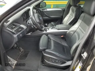 2013 BMW X6 xDrive50i z VIN 5UXFG8C57DL591149, wystawiony jako Copart lot #56979865 z przebiegiem 94 251 mil mil oraz Szkoda całkowita • Salvage title. Historia ofert i sprzedaży dostępna na DreamBid. Obrazek 7.