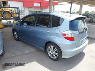 2011 Honda Fit Sport z VIN JHMGE8H54BC021562, wystawiony jako IAAI lot #42369683 z przebiegiem 176 212 mil mil oraz . Historia ofert i sprzedaży dostępna na DreamBid. Obrazek 3.