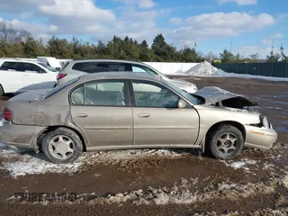 1998 Oldsmobile Cutlass GL z VIN 1G3NB52M9W6300607, wystawiony jako IAAI lot #41575122 z przebiegiem Nie podano mil oraz . Historia ofert i sprzedaży dostępna na DreamBid. Obrazek 13.