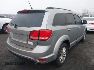 2016 Dodge Journey SXT with VIN 3C4PDDBG2GT242127, listed as a IAAI auction lot 41485555 with 119,728 mi miles. Bid and sale history available at carsss.com. Image 4.