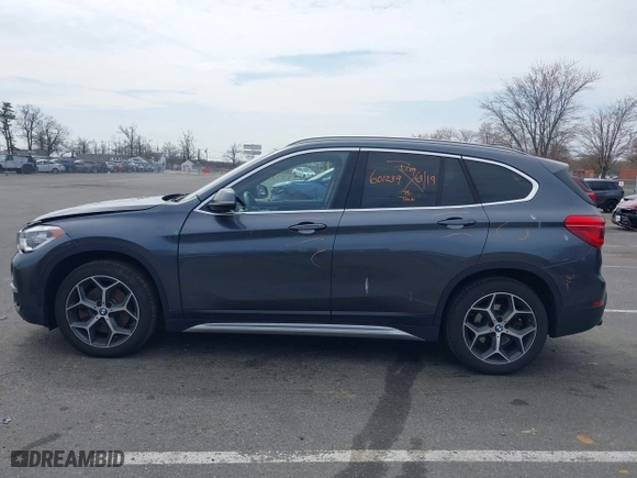 2019 BMW X1 xDrive28i with VIN WBXHT3C51K5L90571, listed as a IAAI auction lot 41909209 with 35,902 mi miles. Bid and sale history available at carsss.com. Image 14.