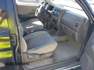 1999 Mitsubishi Montero Sport LS with VIN JA4LS31H7XP018312, listed as a IAAI auction lot 41827943 with 204,814 mi miles. Bid and sale history available at carsss.com. Image 5.